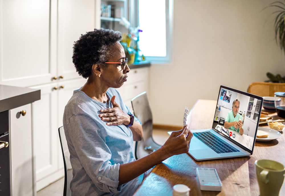 Senior woman on a video call with her doctor